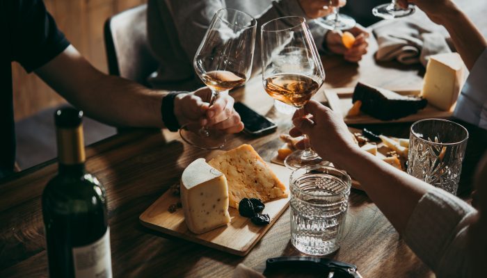 Friends hosting a wine party at High Shoals Yulia Grigoryeva © Shutterstock