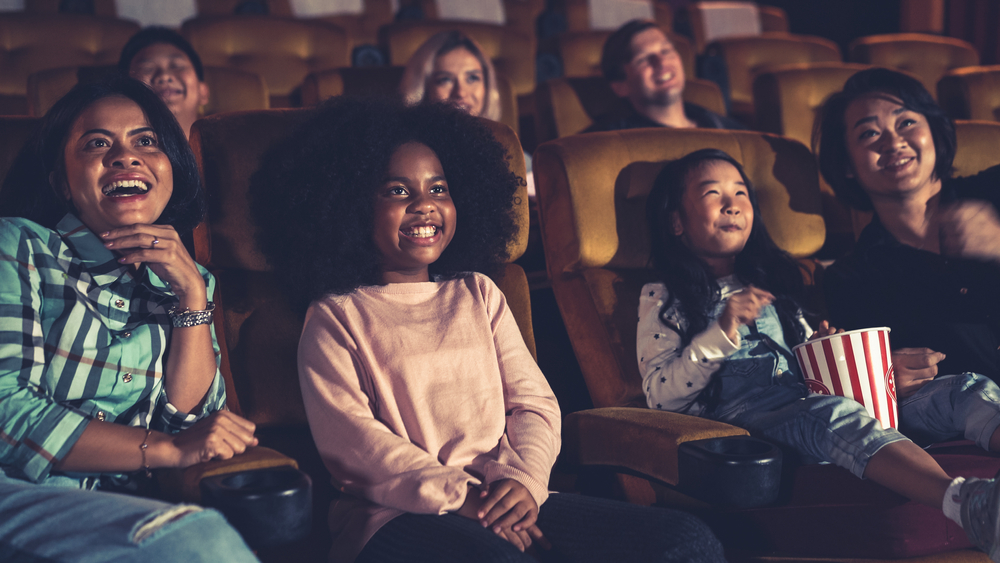 Family Enjoying a Play ©Blue Planet Studio